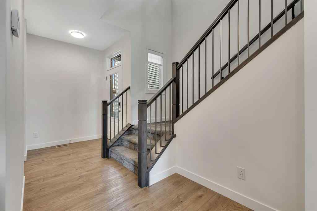 MLS® A2263620 - 211 Creekstone Row SW in Pine Creek Calgary, Residential