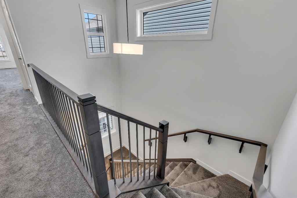 MLS® A2263620 - 211 Creekstone Row SW in Pine Creek Calgary, Residential