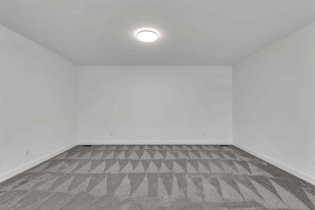 MLS® A2263620 - 211 Creekstone Row SW in Pine Creek Calgary, Residential