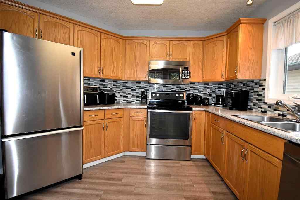 MLS® A2263626 - 309 Eaton Drive  in Eaton Hinton, Residential