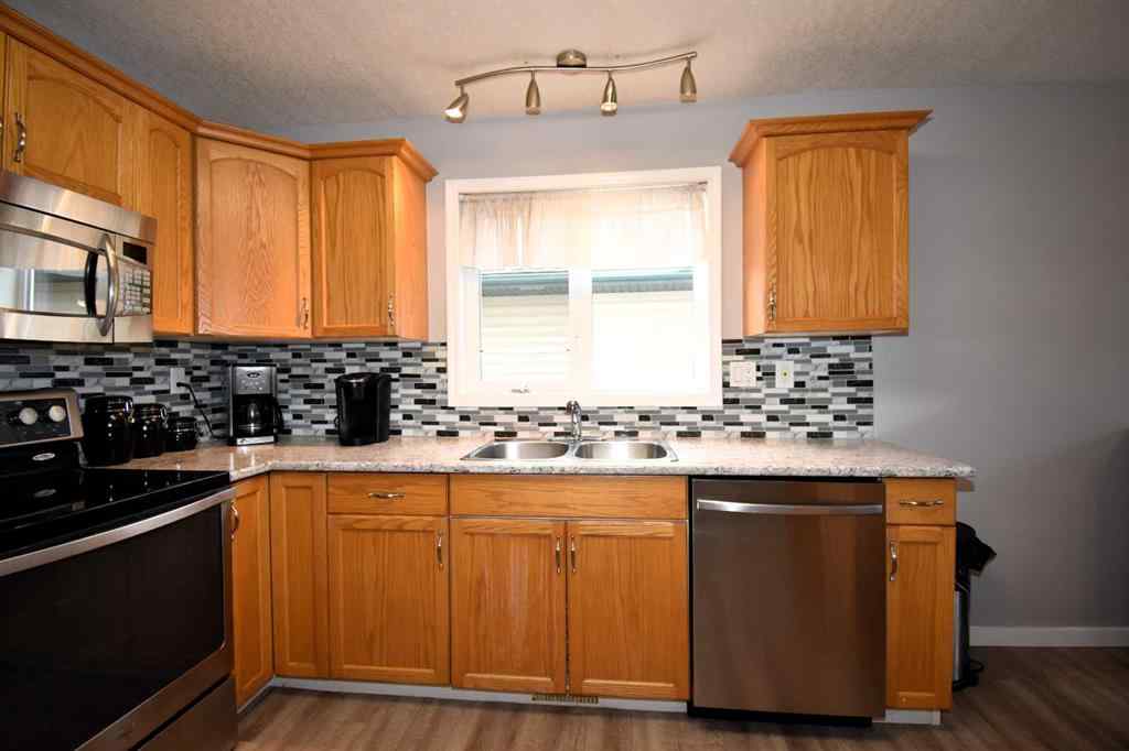 MLS® A2263626 - 309 Eaton Drive  in Eaton Hinton, Residential