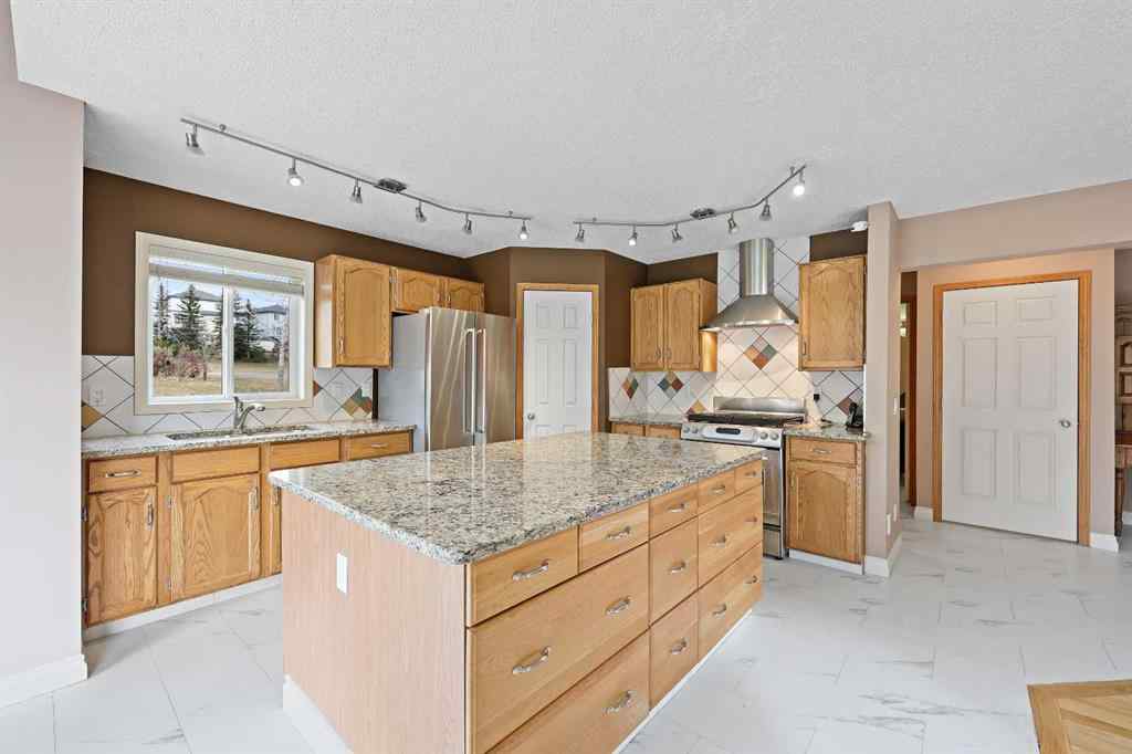 MLS® A2263633 - 161 Arbour Crest Road NW in Arbour Lake Calgary, Residential