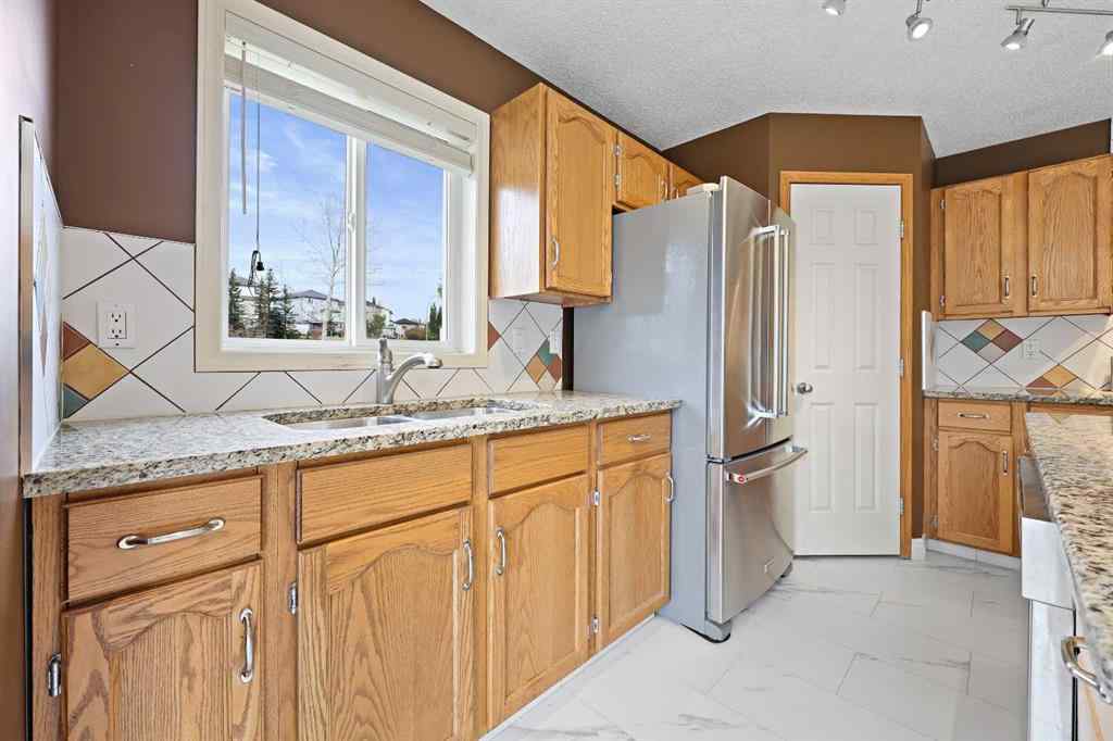 MLS® A2263633 - 161 Arbour Crest Road NW in Arbour Lake Calgary, Residential