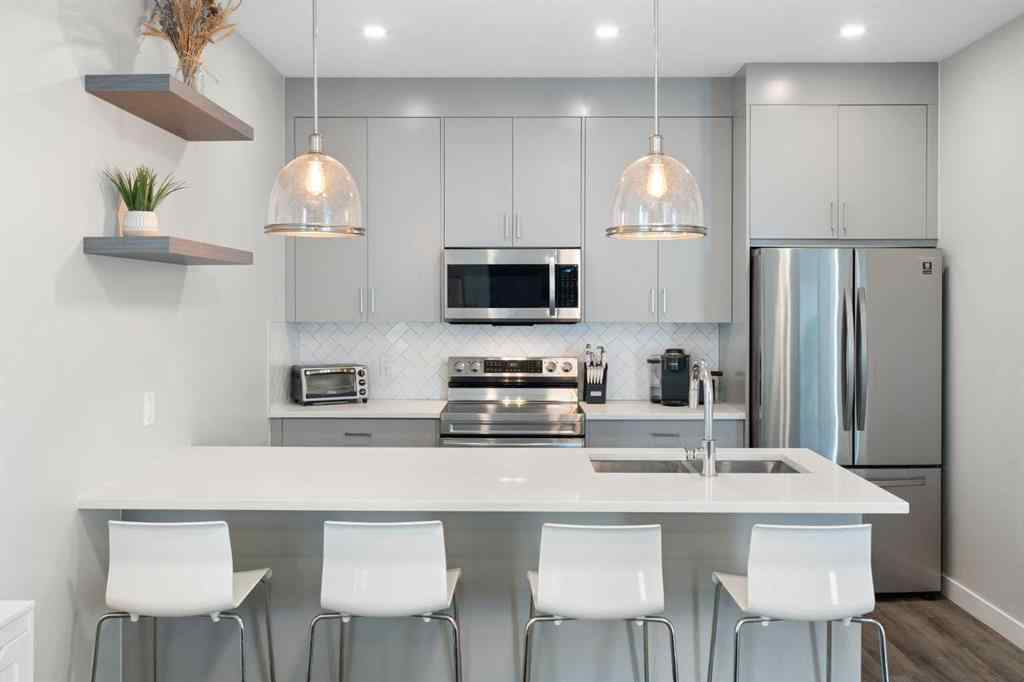 MLS® A2263670 - Unit #2 136 21 Avenue NE in Tuxedo Park Calgary, Residential