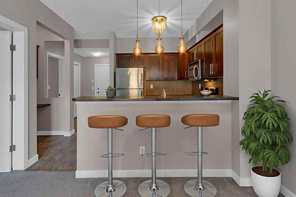 MLS® A2263682 - Unit #111 205 Sunset Drive  in Sunset Ridge Cochrane, Residential