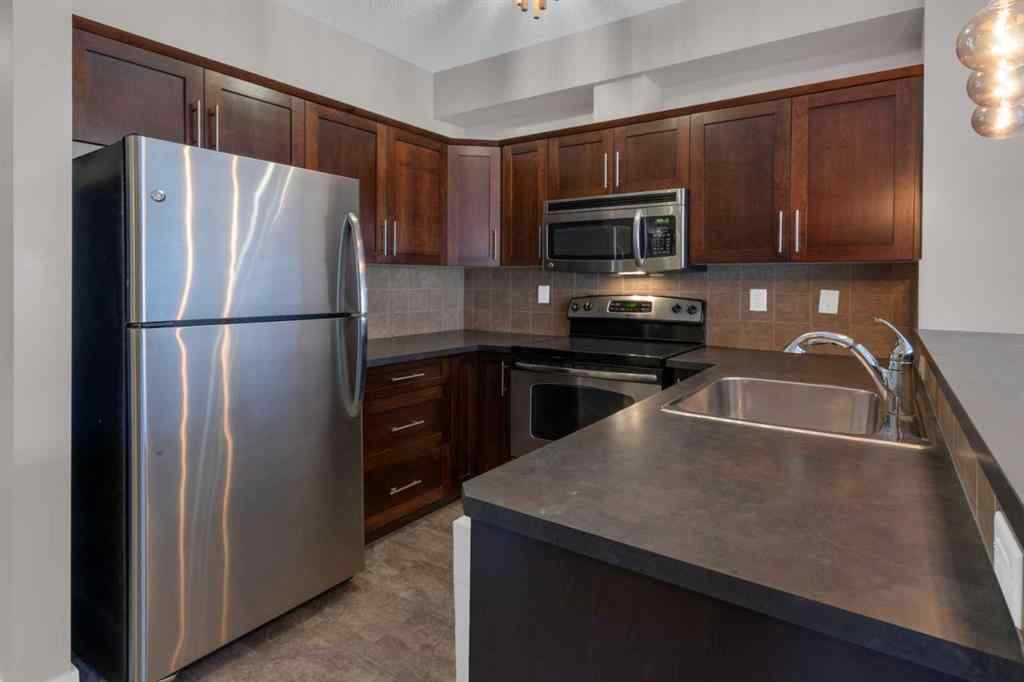 MLS® A2263682 - Unit #111 205 Sunset Drive  in Sunset Ridge Cochrane, Residential