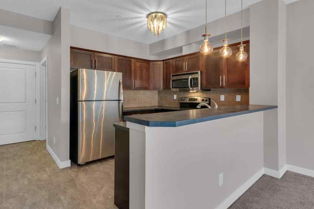 MLS® A2263682 - Unit #111 205 Sunset Drive  in Sunset Ridge Cochrane, Residential