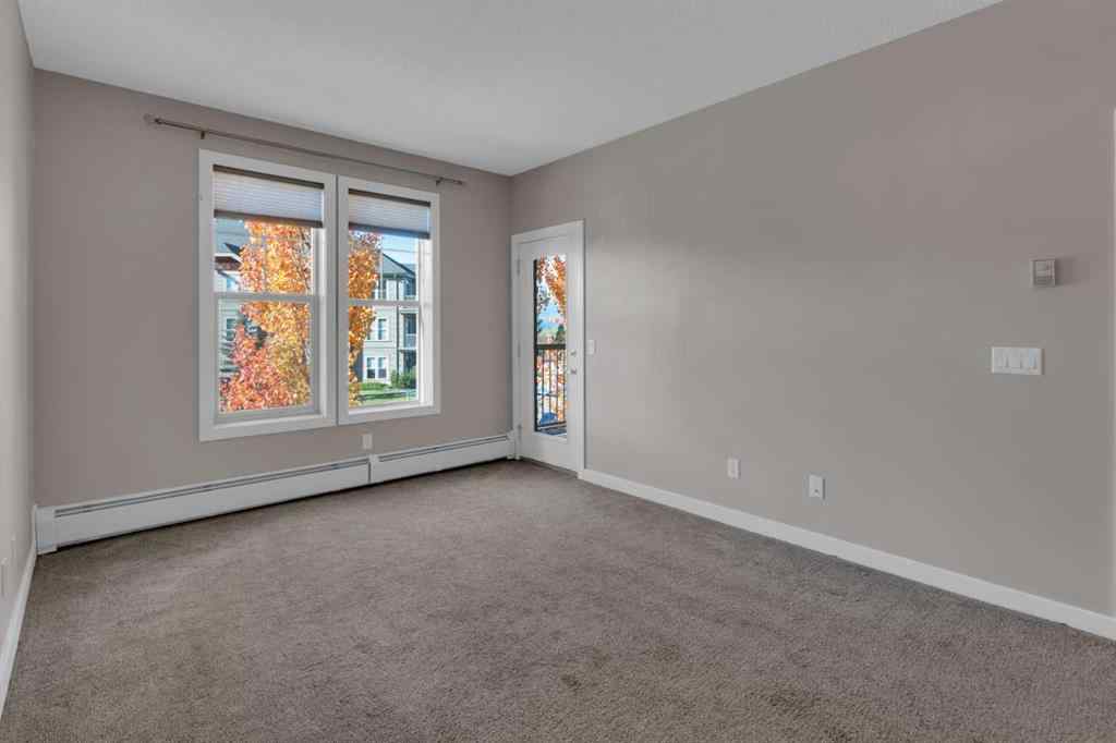 MLS® A2263682 - Unit #111 205 Sunset Drive  in Sunset Ridge Cochrane, Residential