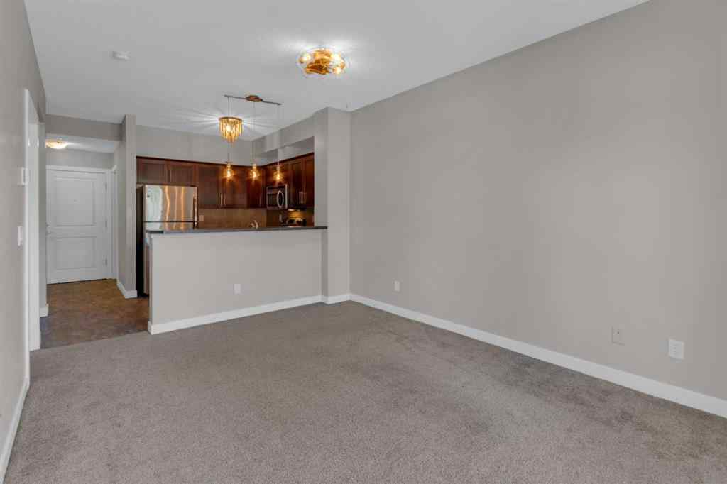 MLS® A2263682 - Unit #111 205 Sunset Drive  in Sunset Ridge Cochrane, Residential