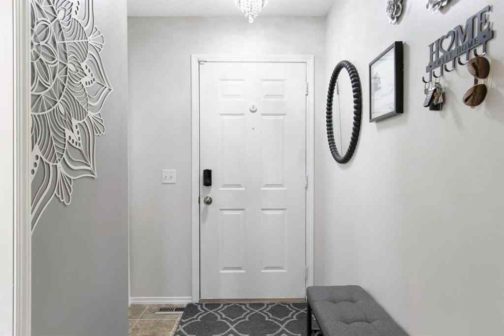 MLS® A2263702 - 206 Mt Aberdeen Manor SE in McKenzie Lake Calgary, Residential