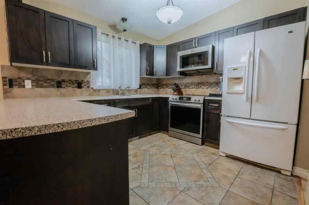 MLS® A2263707 - 9048 104 Avenue  in Crystal Heights Grande Prairie, Residential