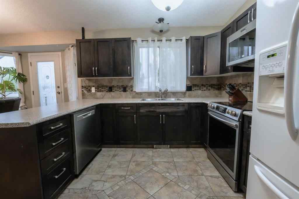 MLS® A2263707 - 9048 104 Avenue  in Crystal Heights Grande Prairie, Residential