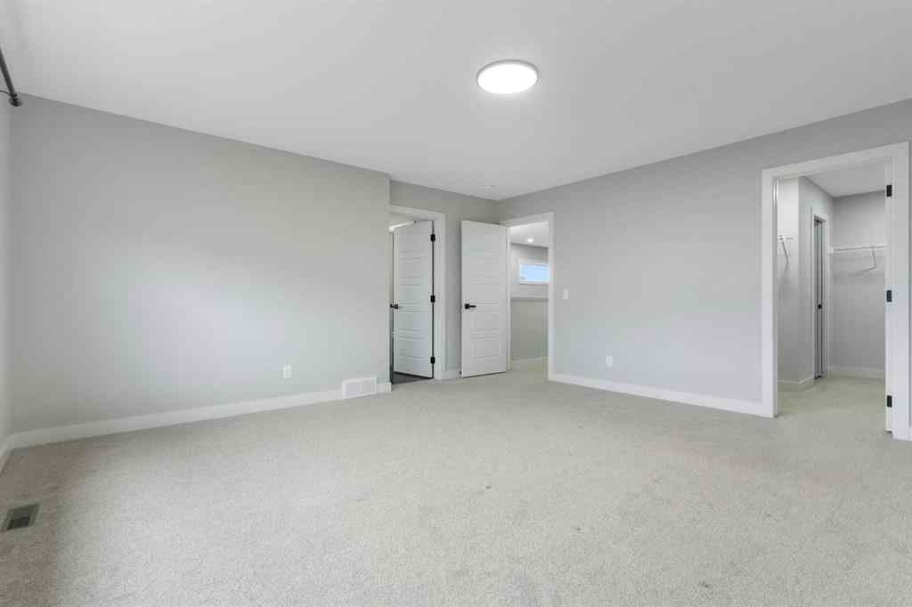 MLS® A2263714 - 97 Amblehurst Gardens NW in Moraine Calgary, Residential