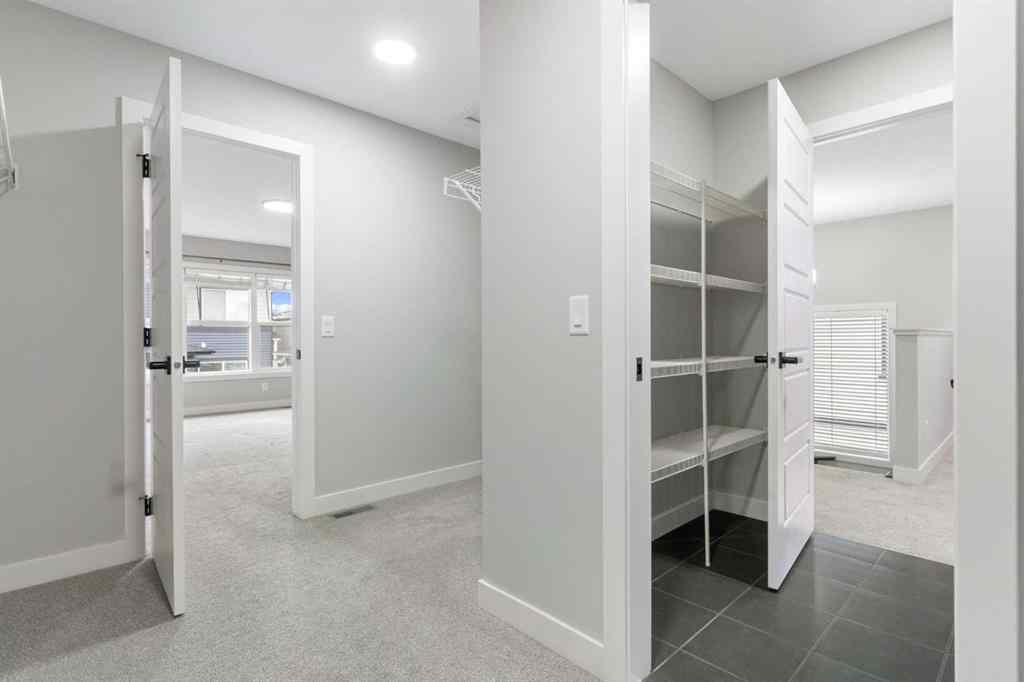 MLS® A2263714 - 97 Amblehurst Gardens NW in Moraine Calgary, Residential