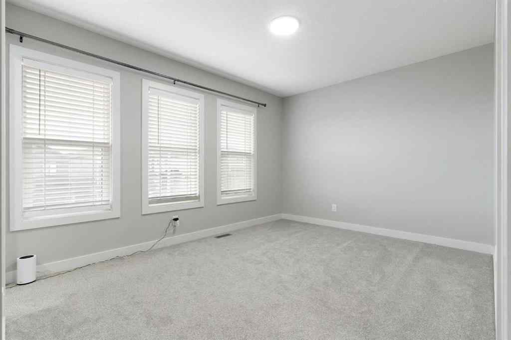 MLS® A2263714 - 97 Amblehurst Gardens NW in Moraine Calgary, Residential