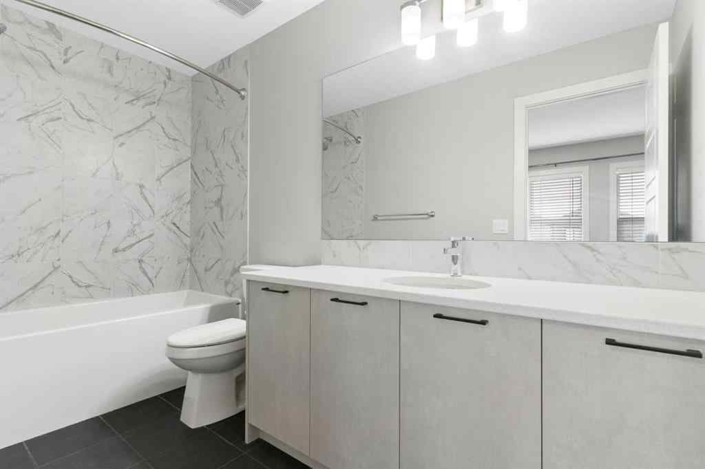 MLS® A2263714 - 97 Amblehurst Gardens NW in Moraine Calgary, Residential