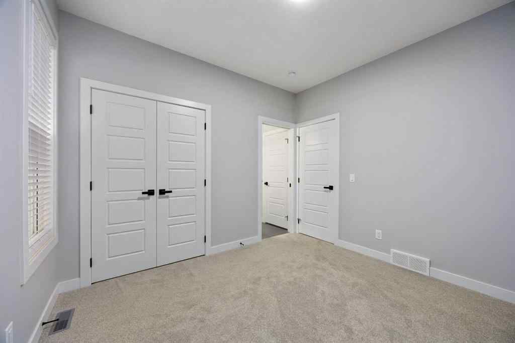 MLS® A2263714 - 97 Amblehurst Gardens NW in Moraine Calgary, Residential