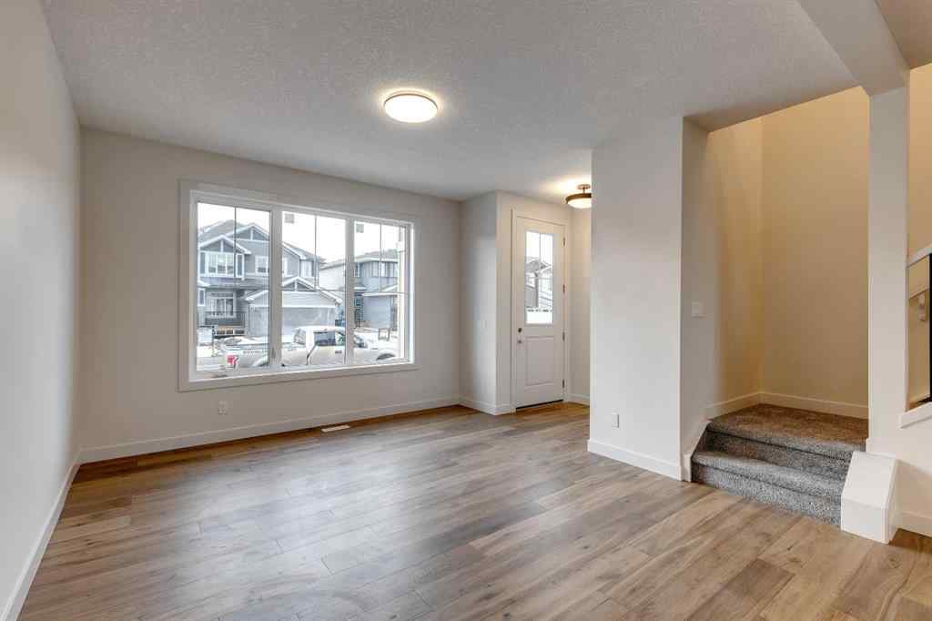 MLS® A2263725 - 330 Sundown Road  in Sunset Ridge Cochrane, Residential