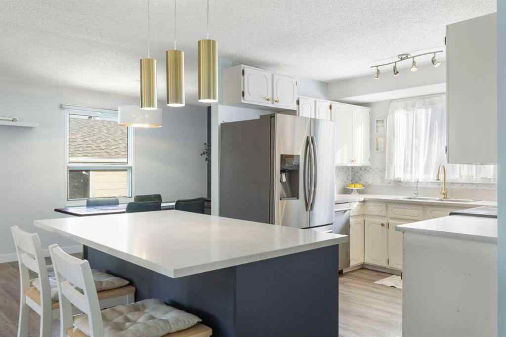 MLS® A2263736 - 27 Deercrest Close SE in Deer Ridge Calgary, Residential