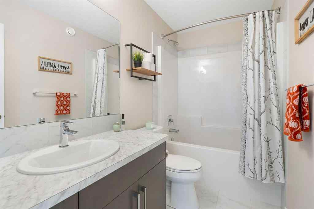 MLS® A2263745 - 75 Buckskin Way  in Heartland Cochrane, Residential