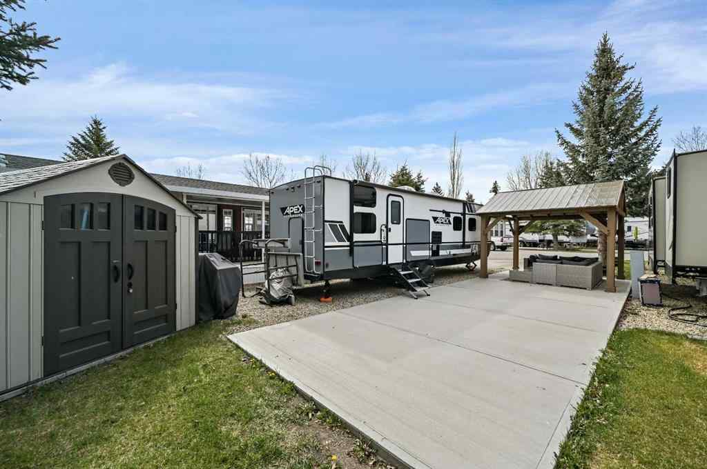 MLS® A2263755 - Unit #115 370165 79 Street E in Country Lane RV Park Rural Foothills County, Land