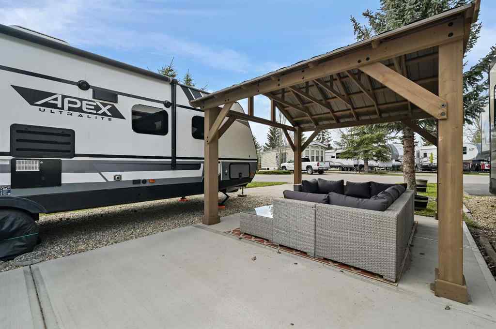 MLS® A2263755 - Unit #115 370165 79 Street E in Country Lane RV Park Rural Foothills County, Land