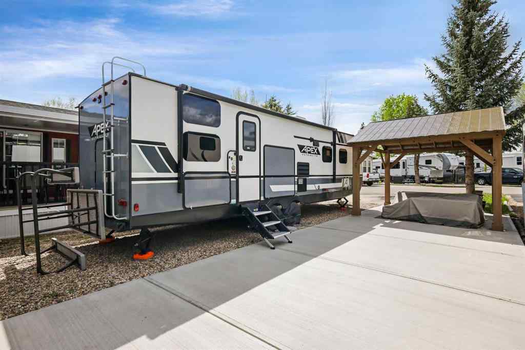 MLS® A2263755 - Unit #115 370165 79 Street E in Country Lane RV Park Rural Foothills County, Land