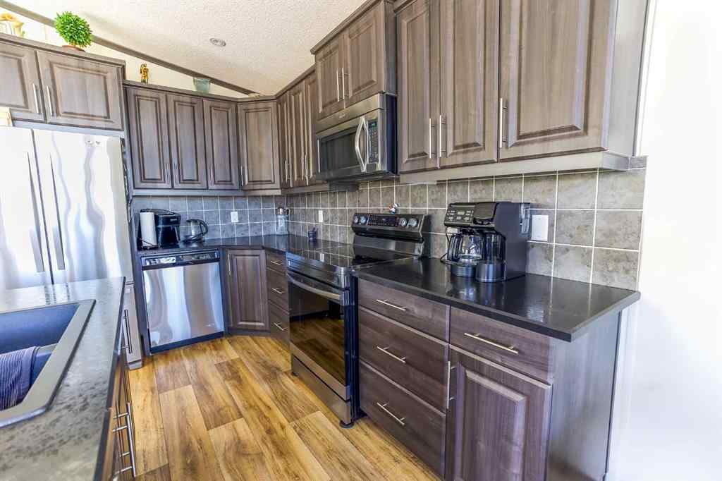 MLS® A2263757 - Unit #130 41019 RR 11   in Sandy Point Rural Lacombe County, Residential