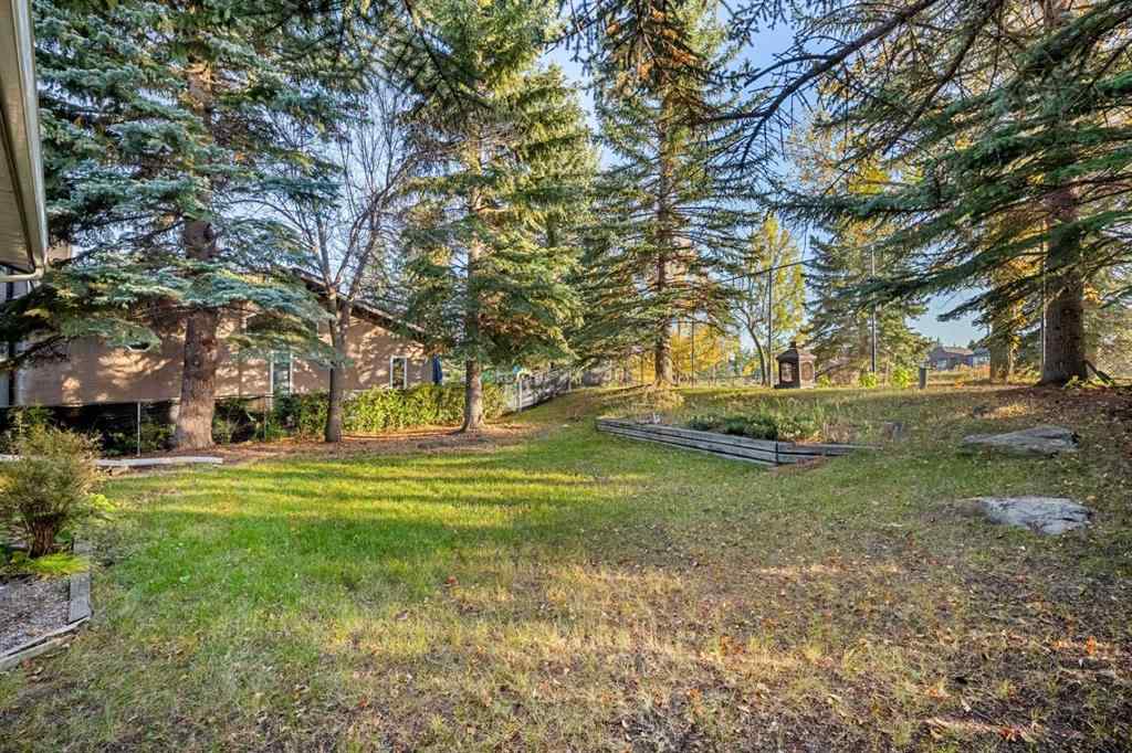 MLS® A2263758 - 907 Shawnee Drive SW in Shawnee Slopes Calgary, Residential