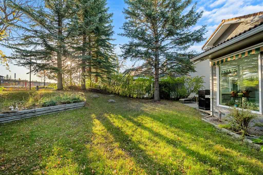 MLS® A2263758 - 907 Shawnee Drive SW in Shawnee Slopes Calgary, Residential