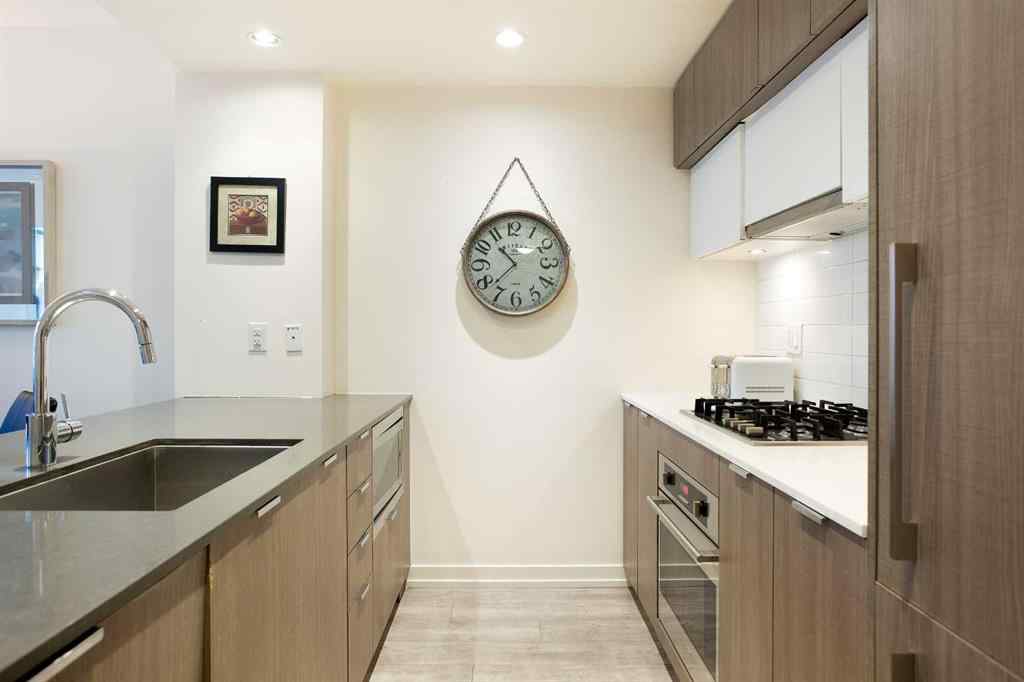 MLS® A2263772 - Unit #205 51 Waterfront Mews SW in Chinatown Calgary, Residential