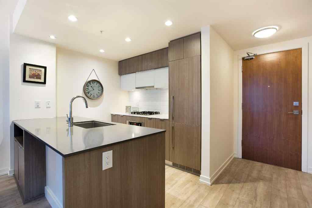MLS® A2263772 - Unit #205 51 Waterfront Mews SW in Chinatown Calgary, Residential