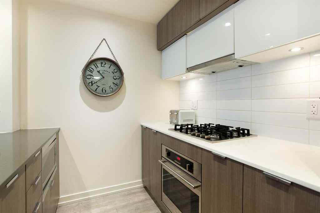 MLS® A2263772 - Unit #205 51 Waterfront Mews SW in Chinatown Calgary, Residential