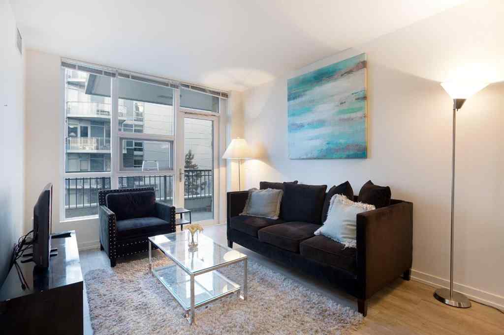 MLS® A2263772 - Unit #205 51 Waterfront Mews SW in Chinatown Calgary, Residential