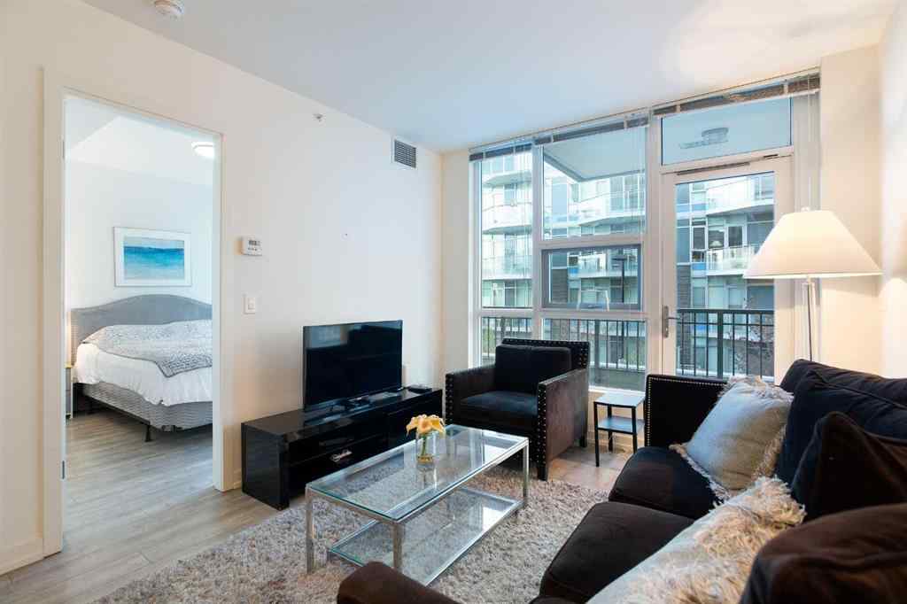 MLS® A2263772 - Unit #205 51 Waterfront Mews SW in Chinatown Calgary, Residential