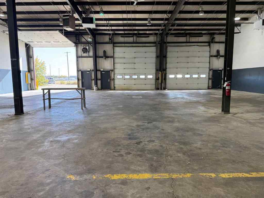 MLS® A2263774 - 18 Sylvaire Close  in Cuendet Industrial Park Sylvan Lake, Commercial