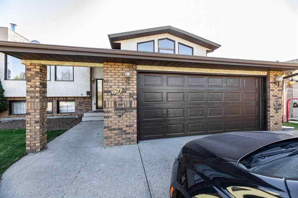MLS® A2263775 - 32 Huget Crescent  in Highland Green Red Deer, Residential