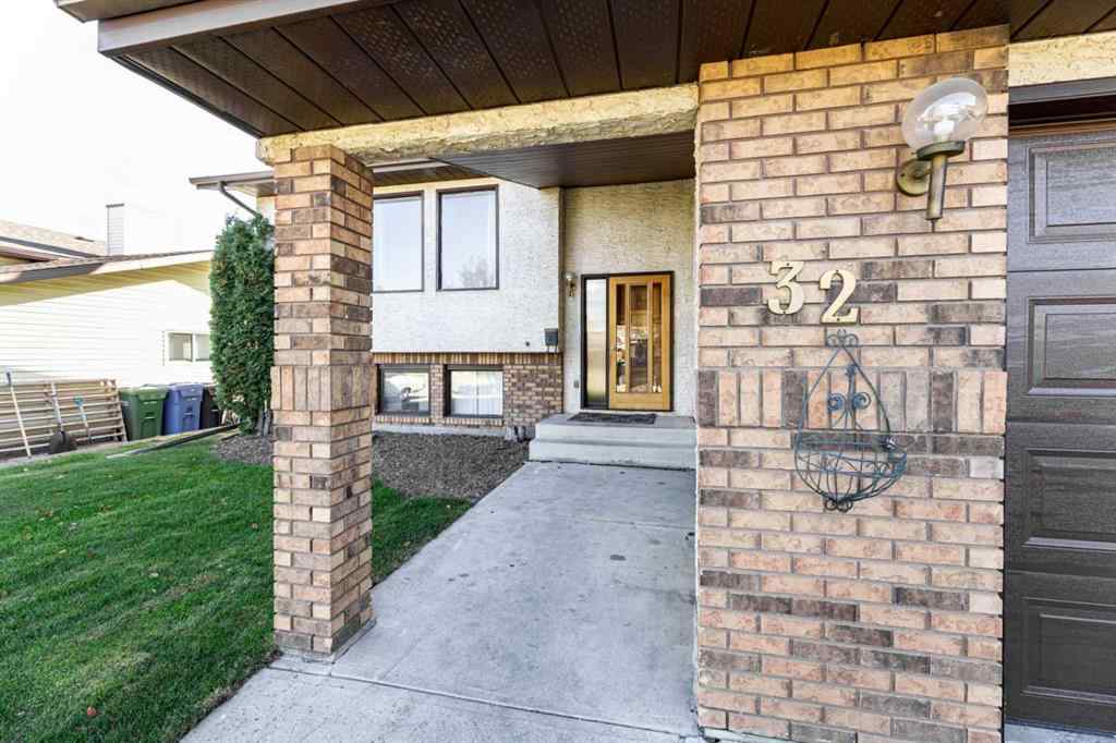 MLS® A2263775 - 32 Huget Crescent  in Highland Green Red Deer, Residential