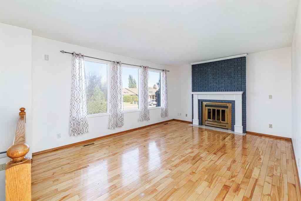 MLS® A2263775 - 32 Huget Crescent  in Highland Green Red Deer, Residential