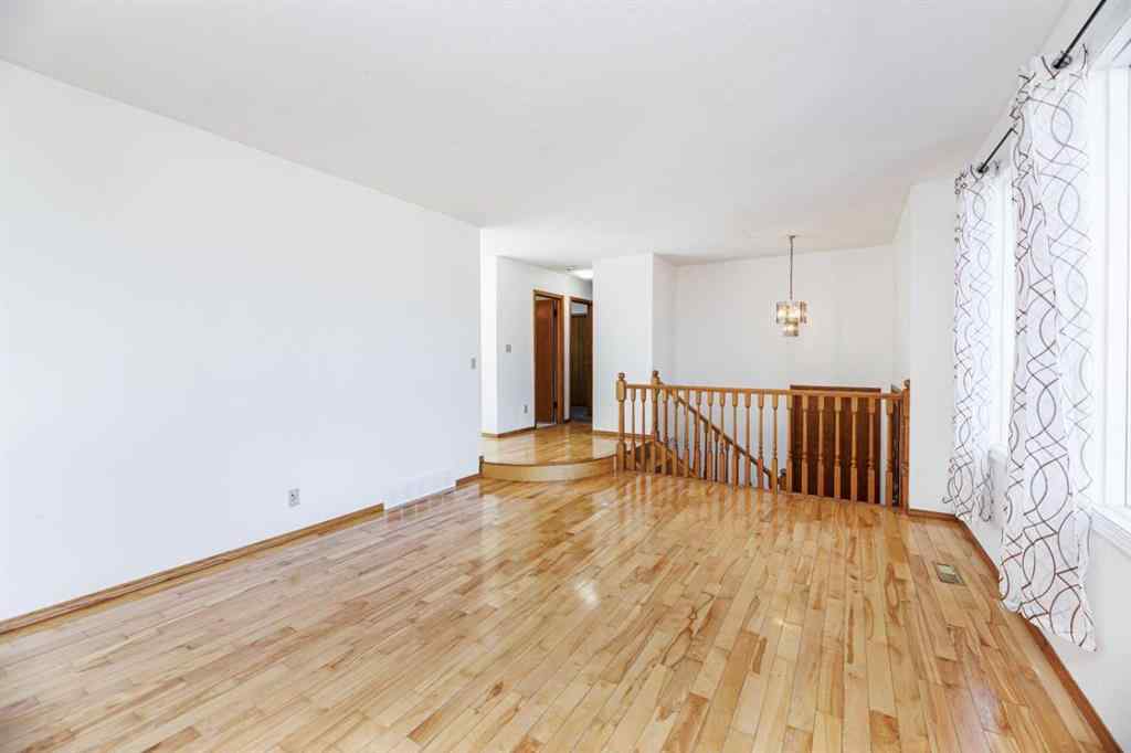 MLS® A2263775 - 32 Huget Crescent  in Highland Green Red Deer, Residential