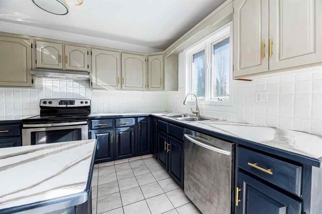 MLS® A2263775 - 32 Huget Crescent  in Highland Green Red Deer, Residential