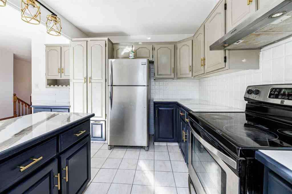 MLS® A2263775 - 32 Huget Crescent  in Highland Green Red Deer, Residential