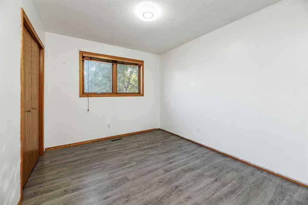 MLS® A2263775 - 32 Huget Crescent  in Highland Green Red Deer, Residential