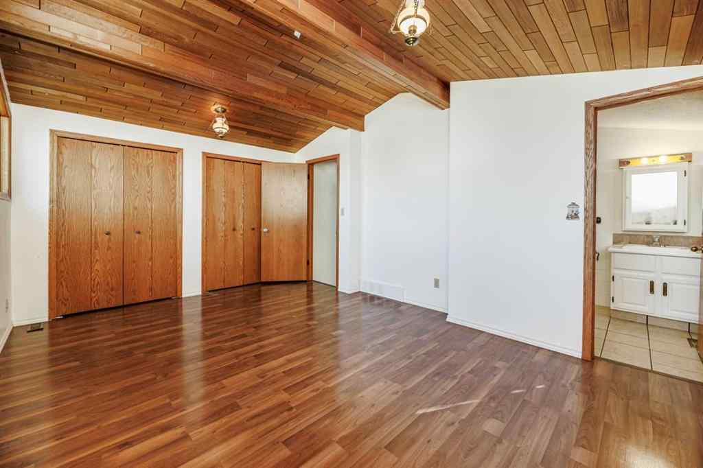 MLS® A2263775 - 32 Huget Crescent  in Highland Green Red Deer, Residential