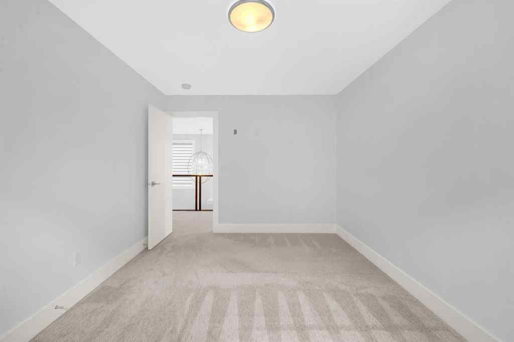 MLS® A2263777 - 127 Evansview Road NW in Evanston Calgary, Residential