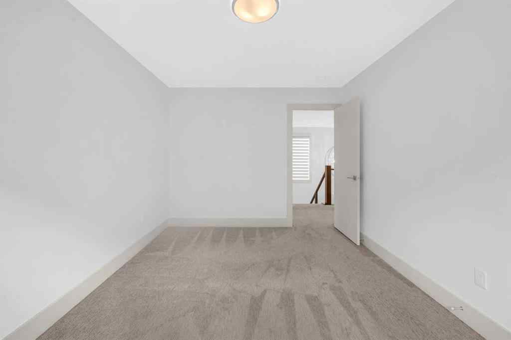 MLS® A2263777 - 127 Evansview Road NW in Evanston Calgary, Residential