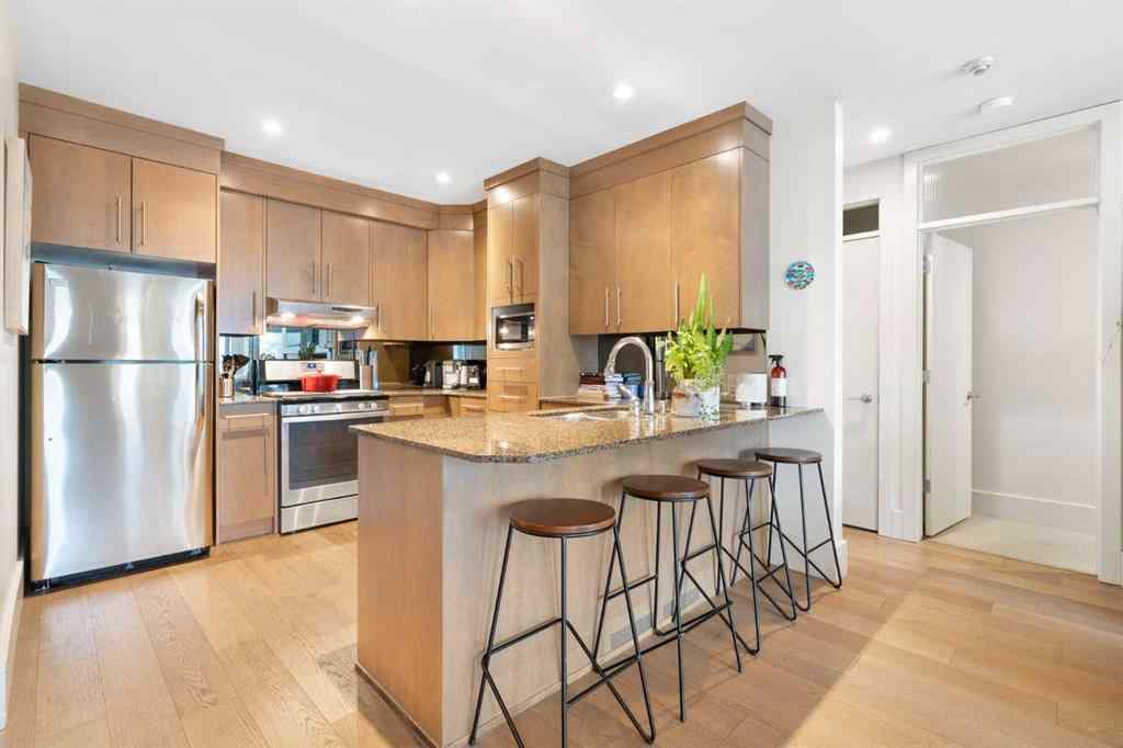 MLS® A2263780 - Unit #102 1407 Kensington Close NW in Hillhurst Calgary, Residential