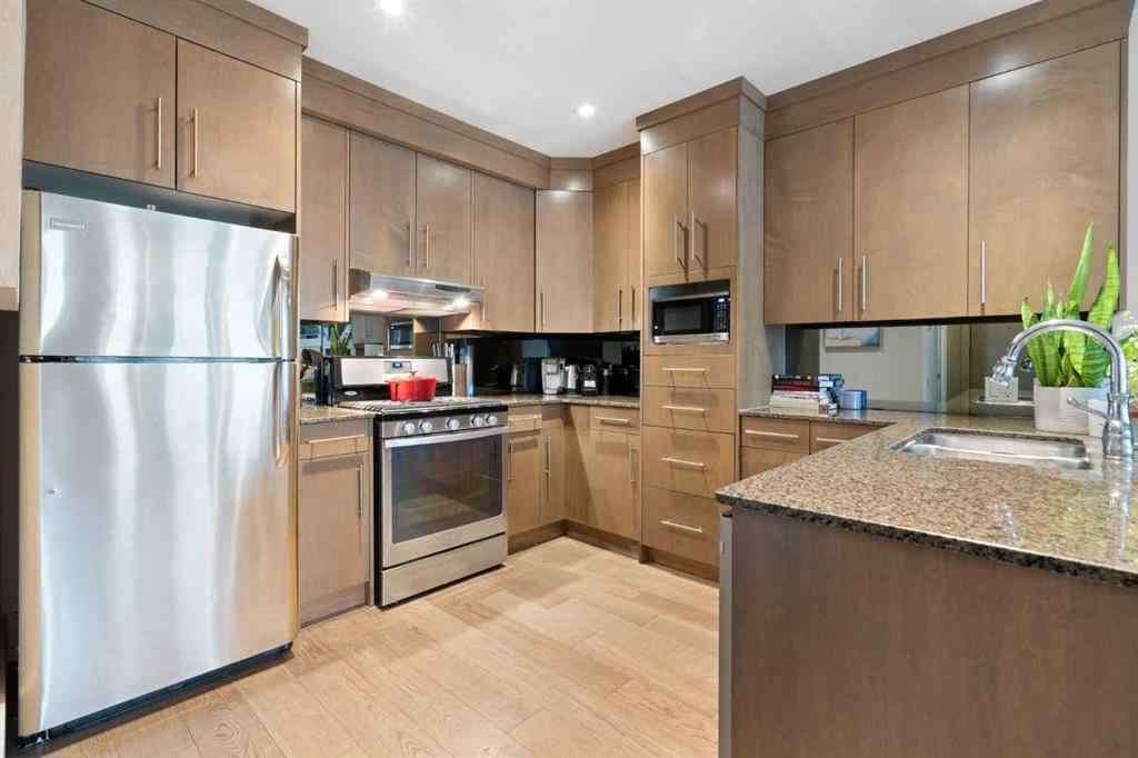 MLS® A2263780 - Unit #102 1407 Kensington Close NW in Hillhurst Calgary, Residential