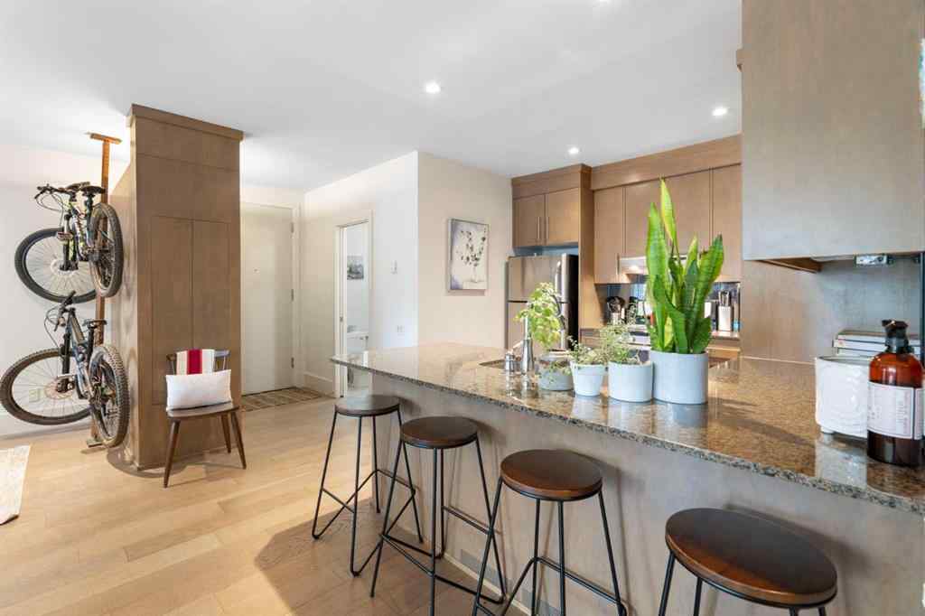 MLS® A2263780 - Unit #102 1407 Kensington Close NW in Hillhurst Calgary, Residential