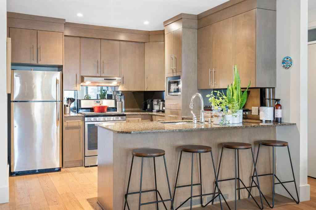 MLS® A2263780 - Unit #102 1407 Kensington Close NW in Hillhurst Calgary, Residential